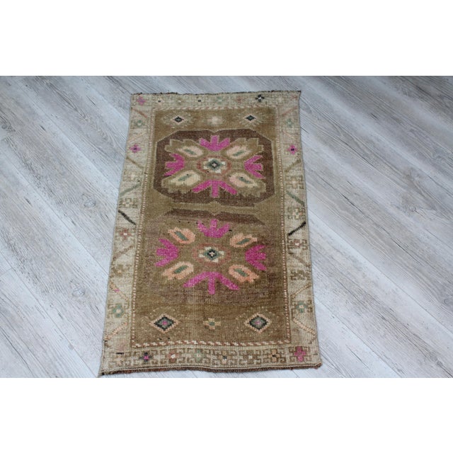 This beautiful, traditional vintage, handwoven Turkish rug is approximately 60 years old. It is handmade of very fine...