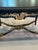 An exceptionally striking French Rococo-style library table or writing desk, newly refinished in a dramatic hand-ebonized...