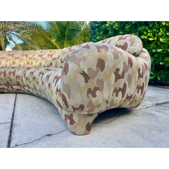 This striking vintage curved sectional sofa is offered in the style of Vladimir Kagan, celebrated for his iconic...