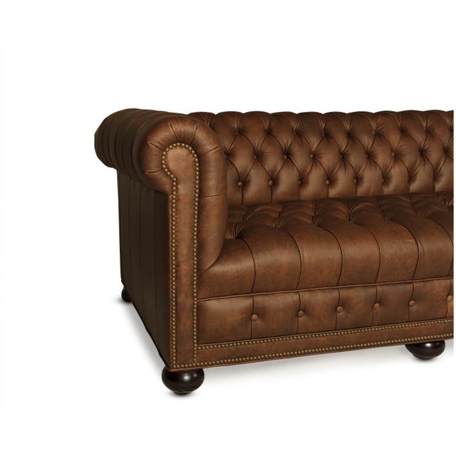 A timeless piece inspired by classic British design. It features deep button tufting, rolled arms level with the backrest,...