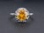A sun kissed tangerine dream! This exceptional 2.88ct GIA certified natural sapphire exhibits a bright yellowish orange...