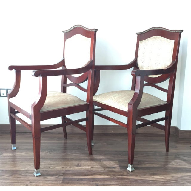 Pair of Swedish Art Deco influenced Klismos armchairs in mahogany with inlay brass.