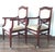 Pair of Swedish Art Deco influenced Klismos armchairs in mahogany with inlay brass.