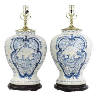 Pair of Vintage Hand Painted Blue and Cream Ceramic Table Lamps With Deer and Floral Folk Art Design For Sale