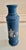 Elegant vintage blue and white ceramic vase in the Neoclassical jasperware tradition, featuring classical figural scenes...