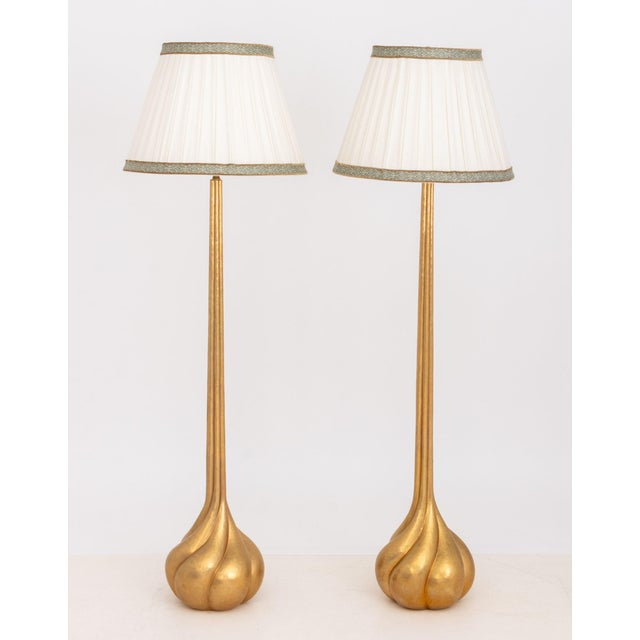 Pair of Robert Kuo Spiral Bulb Form Gilt Brass Floor Lamps, the white linen coolie shades with embroidered trim, marked...