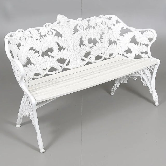 This cast metal bench was made by Melins metal foundry, Anderstorp in Sweden in the 1960s. This piece has an attribution...