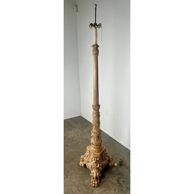 19th C. carved wood Louis XV style French standing lamp. The lamp has a tripod base and sits on beautifully carved paw...