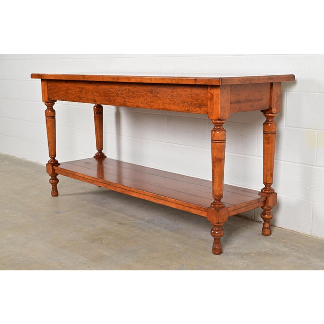 A gorgeous Italian Provincial or Rustic European style solid maple single drawer sideboard, buffet server, or console...