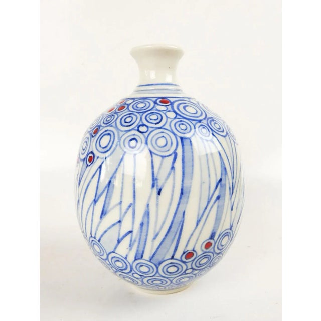 2019 porcelain pottery bottle vase by Texas artist Vorakit Chinookoswong. Highly regarded ceramic artist, whose pieces are...
