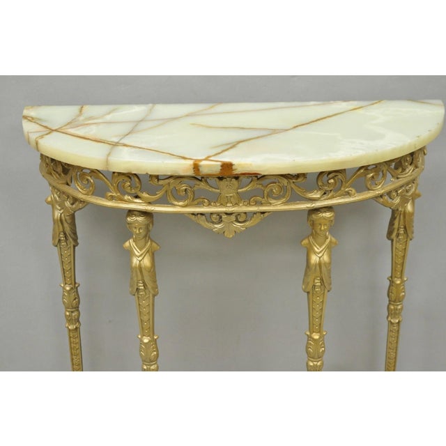 Antique Gothic Revival Oscar Bach Style Figural Bronze & Onyx Gold Painted Small Console Table. Circa Early 20th Century....