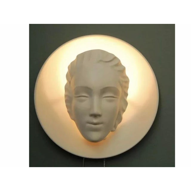 Art deco sconce lamp of lady face plate is metal and face is plaster From the 30’s For condition please refer to photos