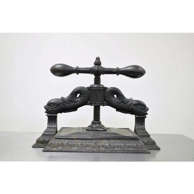 Antique 19th C. Cast Iron Classical Figural Dolphin Victorian Book Press. Item features intricate supports with dolphins...