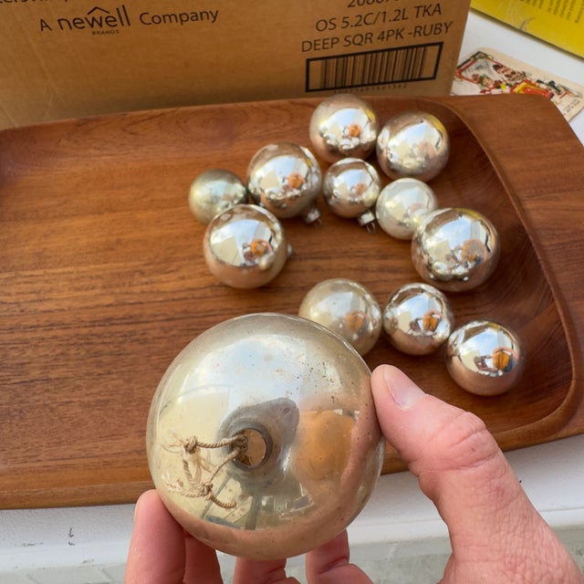 Ranging in size from 1.5 inches to roughly 4 inches in diameter. Vintage Shiny Brite Mercury glass ornaments in silvery...