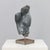 A refined abstract sculpture by dutch artist ineke van zuuren, created in the 1980s. The work is carved from dolomite...