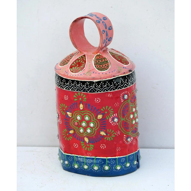 The bell is made of iron and coated primarily with copper, along with a few other metals. They are made from scrap iron...