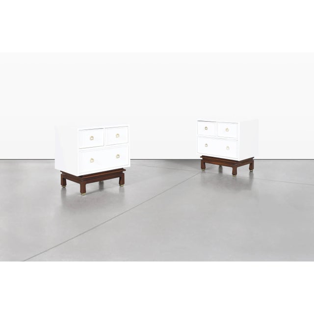 A striking pair of mid-century modern nightstands by American of Martinsville, crafted in the United States during the...