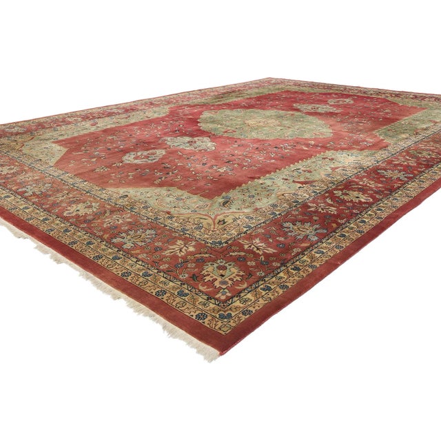 78897 Vintage Indian Agra Rug, 10'02 x 14'02. This hand-knotted wool vintage Indian Agra rug is a captivating masterpiece...