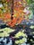 This captivating work depicts a vibrant autumnal landscape with masterful control of color and texture. The trees, painted...