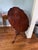 Excellent condition. Beautiful scalloped pie crust table top, on three legs. Sturdy and strong. Approx 24” diameter x 29”...