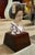 Design Plus Gallery presents a Signed Geisha Sculpture on a Stand. This finely detailed vintage Japanese female bust with...