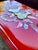 A striking mid-century Japanese lacquer smoking box in a luminous oxblood-red finish with hand-applied mother-of-pearl...