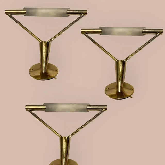 Brass satinated glass sconces set of 3 1990’s by egoluce italy height 25 cm width 29 cm depth 24 cm features 1 light...