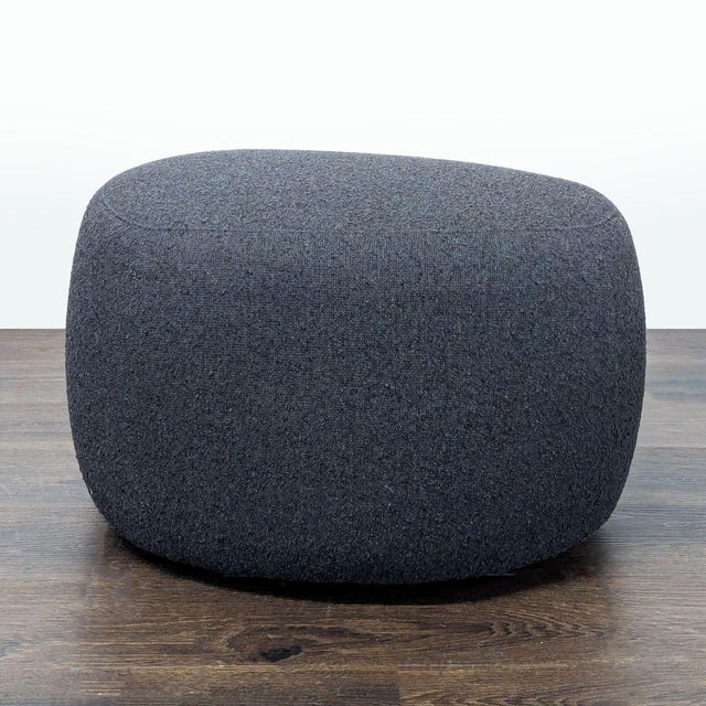 The Asher ottoman is a versatile modern accent piece reminiscent of river stones. Perfect as a coffee table, extra seating...