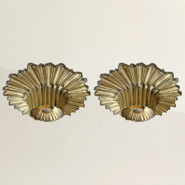 A study in glamour pared back to its essentials, this pair of early 20th-century American Art Deco flush-mount ceiling...