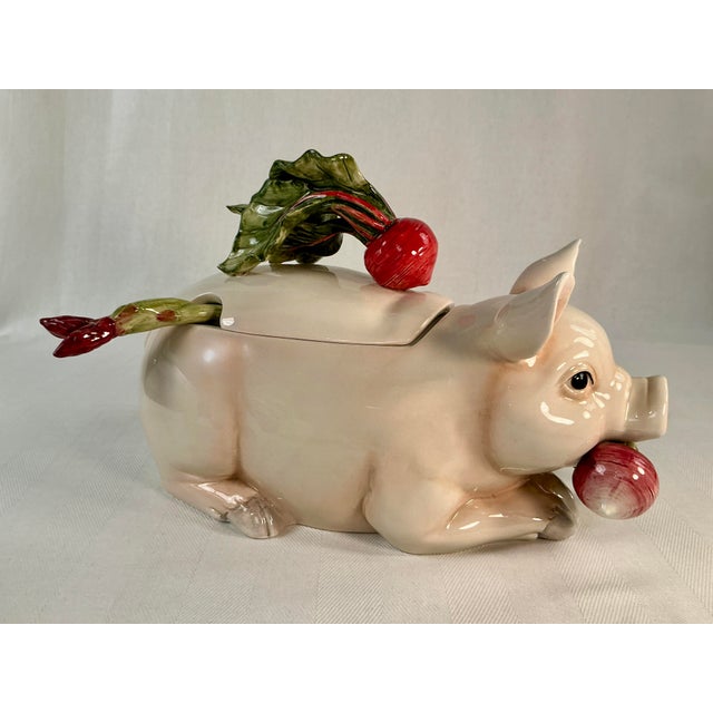 This adorable vintage tureen is sure to be a conversation starter at your next gathering. It features a whimsical design...