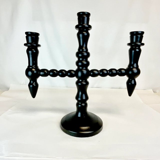 This is a stunning Mexican wooden Candelabra. It has three hand-turned candle holders with bobble arms and extensions....