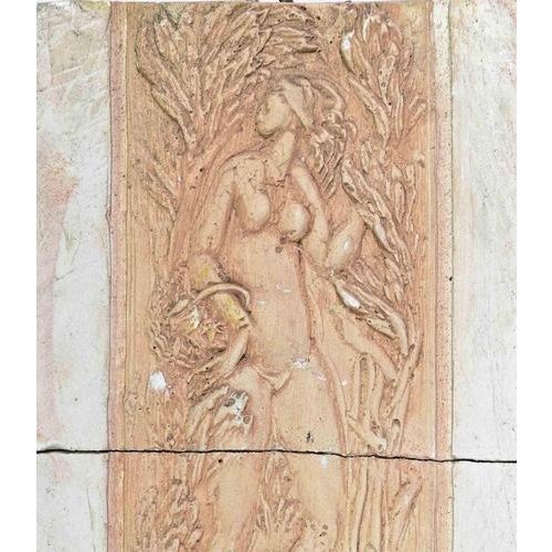 Painting and embossing on cement panel realized in the mid-20th Century. Good condition, with minor losses.
