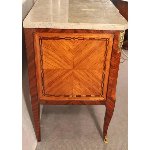 18th century, Louis XVI Commode, France, 1780, decorated with beautiful flower and geometrical marquetry made of kingwood...