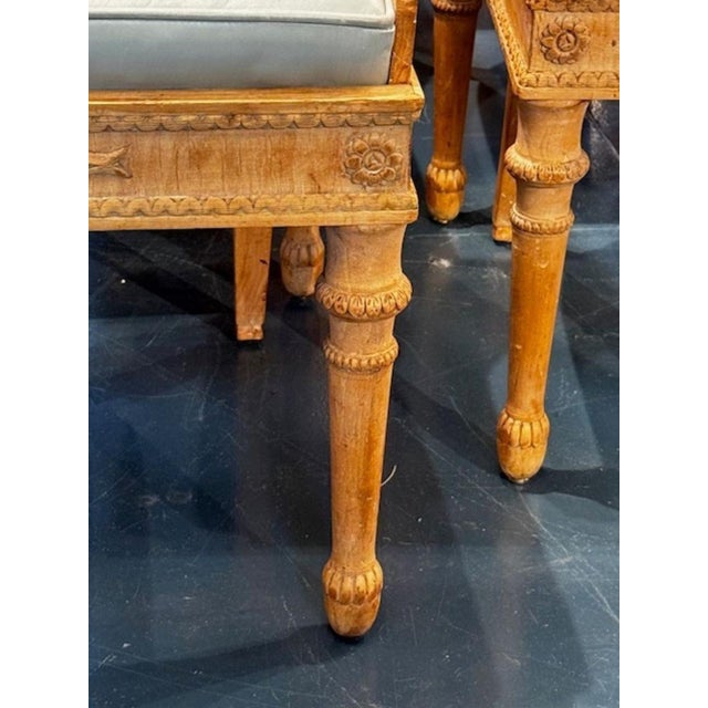 Handsome set of six French Empire carved and bleached mahogany dining chairs. The intricate carvings on the chairs...