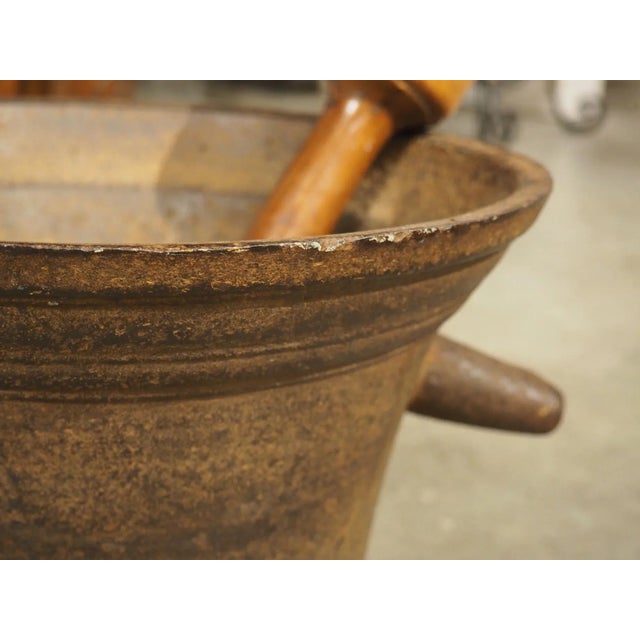A unique example of the traditional French pharmacy mortar, this cast iron version is from circa 1800 and features a large...