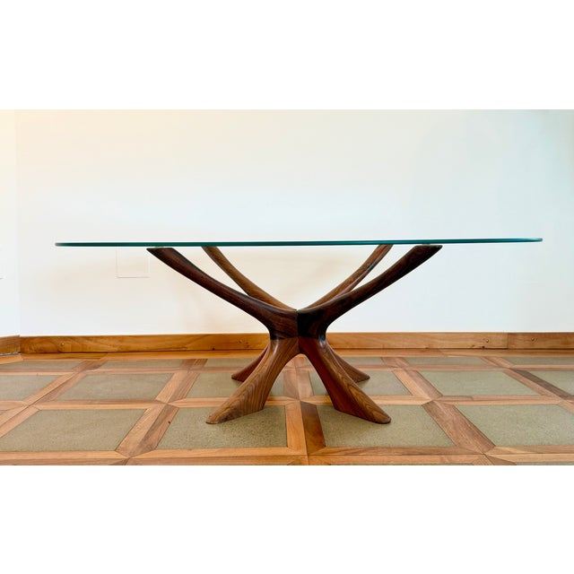 Introducing the Illim Oval Glass Coffee Table, a Danish mid-century classic designed by Illum Wikkelsø. This sculpted...