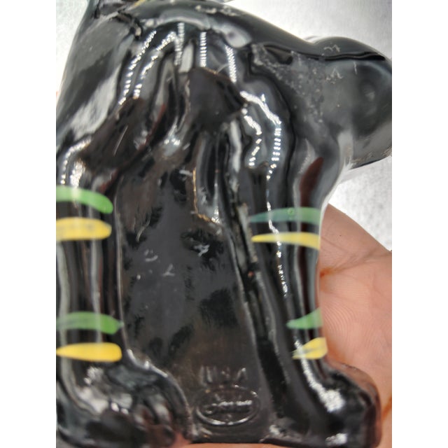 FENTON ART GLASS SCAREDY CAT FIGURINE, handprinted BY C. MACKEY, stands 4.3/8 inches tall.