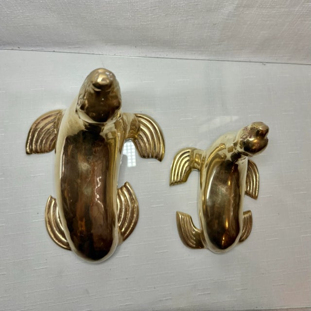 Chic Vintage Mid-Century Brass Sea Lions Pair - Elegant Metal Art for Home Decor For Sale - Image 10 of 10