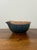 A beautifully handcrafted vintage studio pottery pouring bowl featuring a rich cobalt-blue glaze decorated with rhythmic...