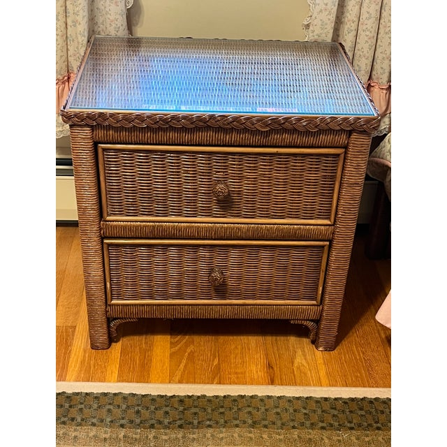 These two Henry Link nightstands, from Series No 255 are genuine imported woven wicker in a Cocoa Brown Finish with Pulls...