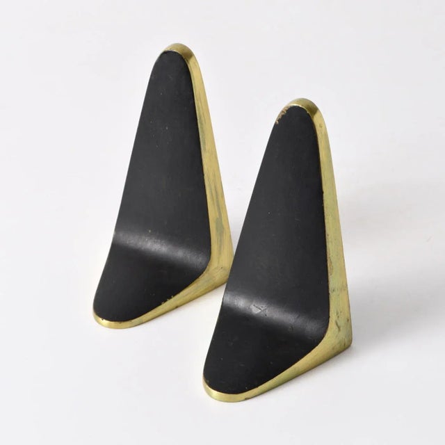 High quality brass bookends in mid-century modern style. Designed and made by Hagenauer Workshop in Vienna, Austria for...