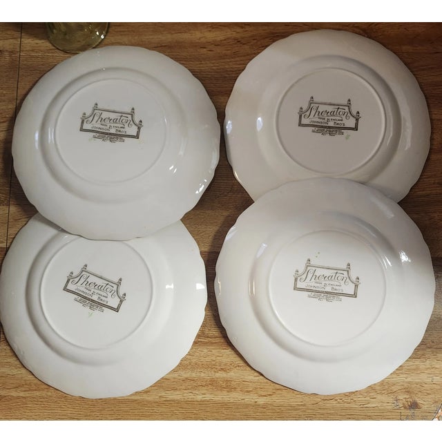 Beautiful set of four vintage Johnson Bros **Sheraton** dinner plates featuring an elegant floral pattern and timeless...