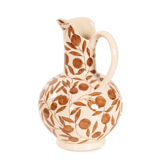 Warm and earthy, the Olivia Water Pitcher blends artisanal style with rustic charm. The rich, golden-hued leaves wrap...