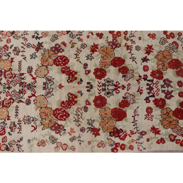 Tribal Vintage Turkish Oushak Rug in All-Over Flower Design Background & Simple Boteh Border For Sale - Image 3 of 13