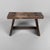 Rustic Japanese wooden stool dating from 1950–1960, featuring a simple design and a warm, timeworn patina. Dimensions: H...