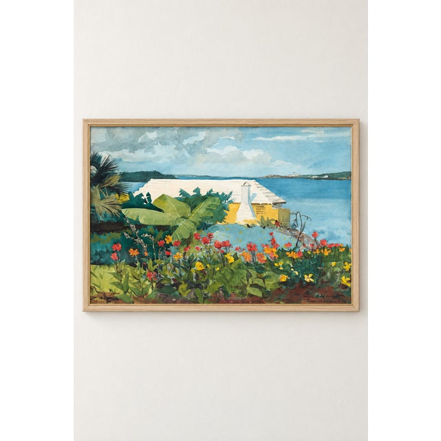 This vintage Bermuda coastal landscape art print by Winslow Homer captures a brilliant tropical flower garden overlooking...