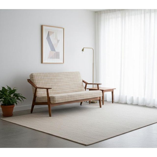 Elegant teak sofa designed by h. Brockmann-petersen and produced by randers møbelfabrik in the 1960s. A light and refined...