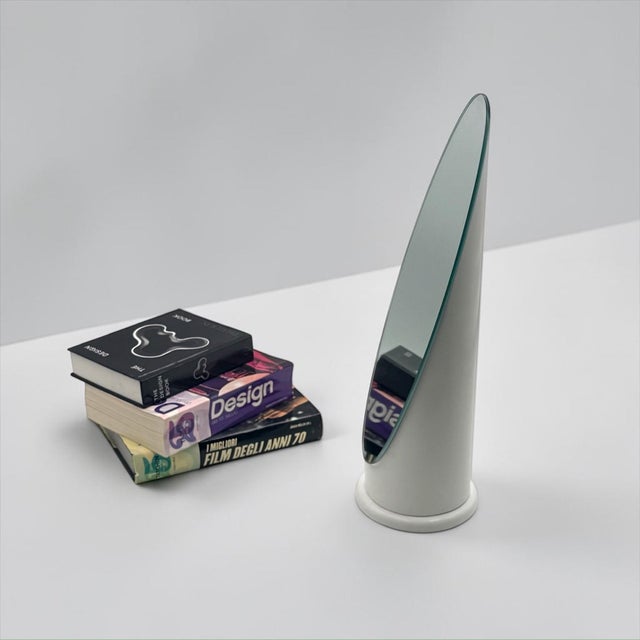 Sculptural Lipstick tabletop mirror produced in Italy during the 1970s. Made from white molded plastic, the design...