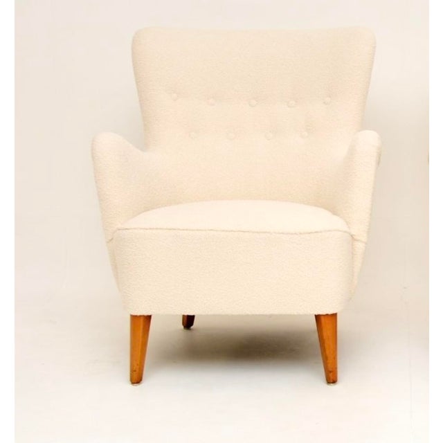A stylish and extremely comfortable Swedish vintage armchair by Folke Ohlsson for Dux. This is an early model dating from...