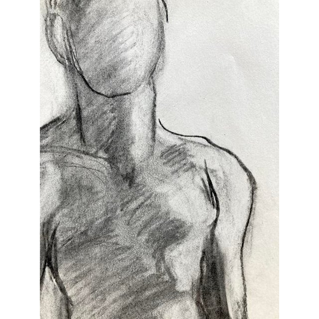 Large charcoal figure drawn from life on 18" x 24" off white newsprint. Subtle tones of black, white and grey. Would look...